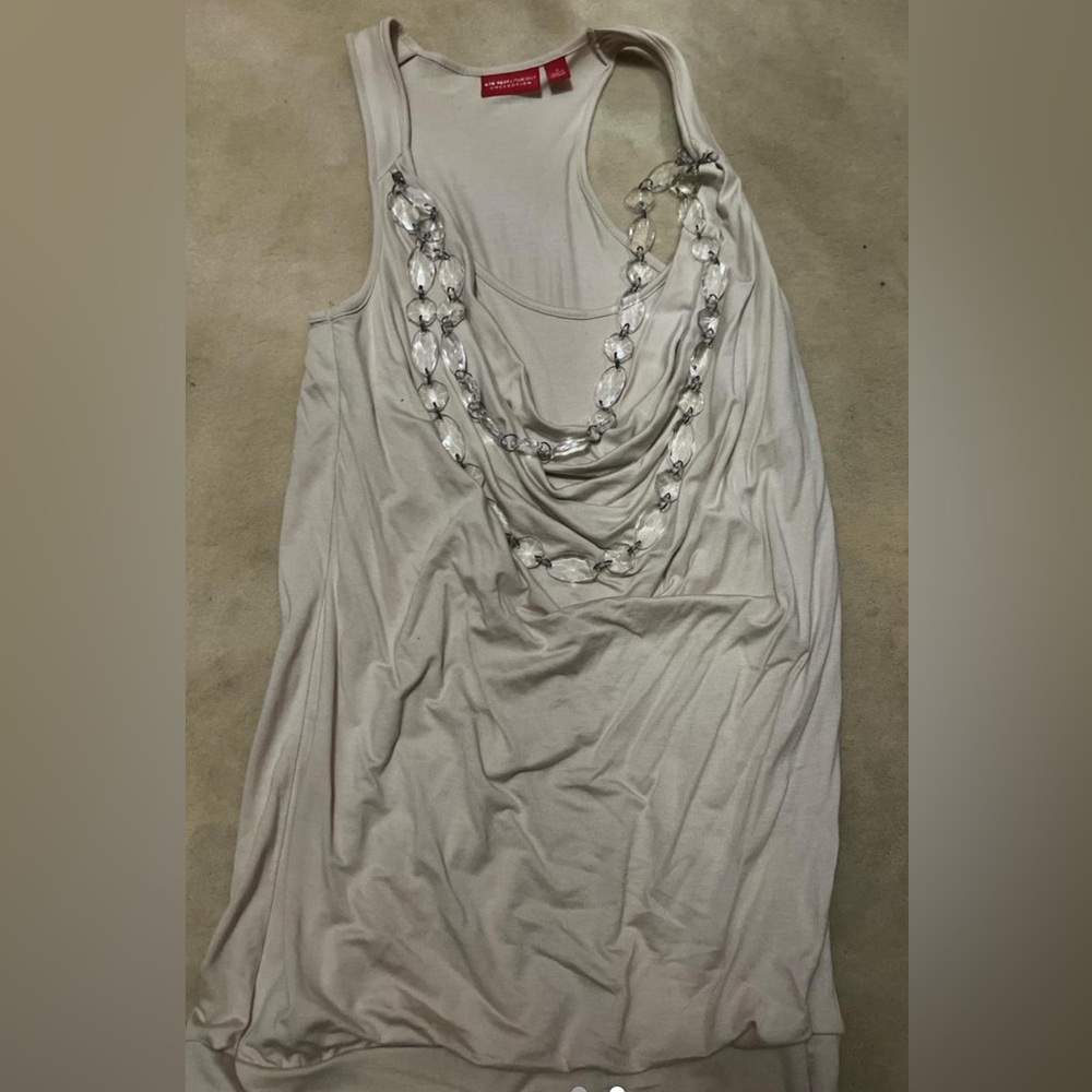 Elegant Cream Sleeveless Top with Beaded Necklace